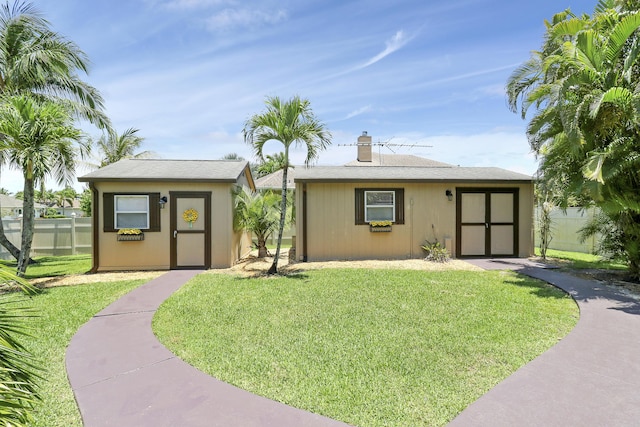 3429 SW Catskill Dr, Port Saint Lucie, FL 34953 - ranch-style home featuring a shed and a chimney