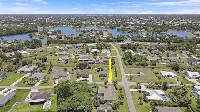 3429 SW Catskill Dr, Port Saint Lucie, FL 34953 - aerial view of property and surrounding area with a nearby body of water and nearby suburban area