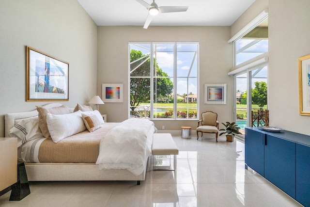 391 Isle Ct, Palm Beach Gardens, FL 33418 - bedroom featuring multiple windows, access to outside, and ceiling fan