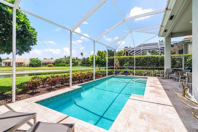 391 Isle Ct, Palm Beach Gardens, FL 33418 - swimming pool with a patio area, a water view, and a lanai