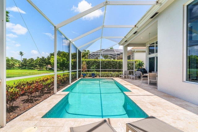 391 Isle Ct, Palm Beach Gardens, FL 33418 - swimming pool with a patio area and a lanai