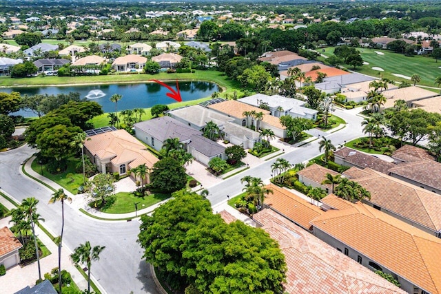 391 Isle Ct, Palm Beach Gardens, FL 33418 - aerial perspective of suburban area with a nearby body of water