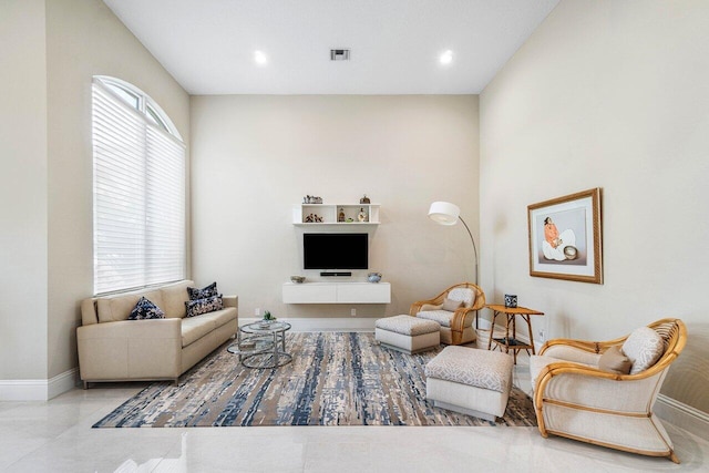 391 Isle Ct, Palm Beach Gardens, FL 33418 - living room with baseboards and recessed lighting