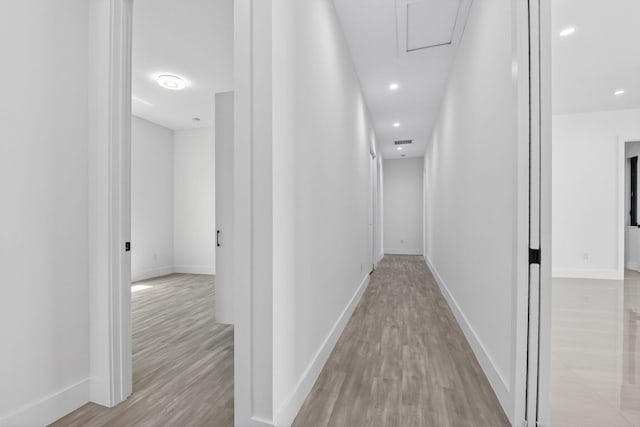 3920 Espan Ct, Palm Springs, FL 33461 - corridor featuring light wood finished floors and recessed lighting