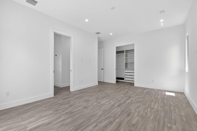 3920 Espan Ct, Palm Springs, FL 33461 - spare room with light wood-type flooring and recessed lighting