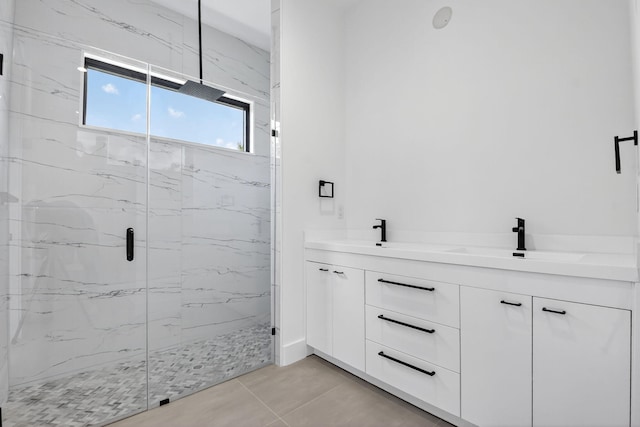 3920 Espan Ct, Palm Springs, FL 33461 - bathroom with a marble finish shower, double vanity, and tile patterned floors