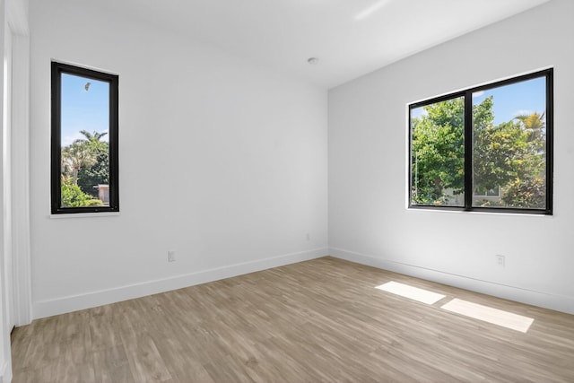 3920 Espan Ct, Palm Springs, FL 33461 - empty room featuring light wood-style flooring