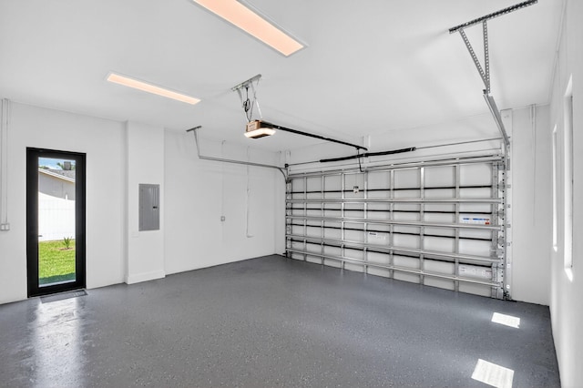 3920 Espan Ct, Palm Springs, FL 33461 - garage featuring electric panel and a garage door opener