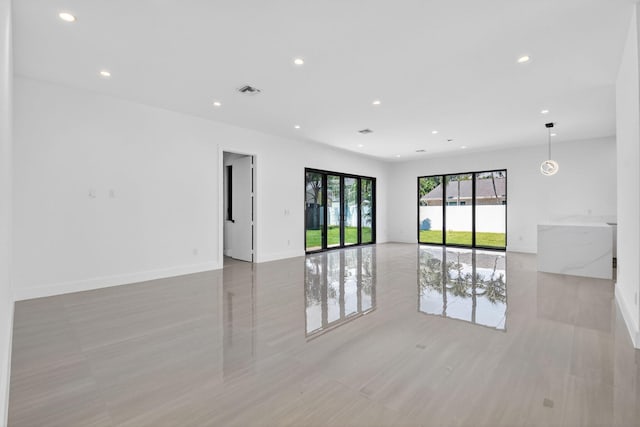 3920 Espan Ct, Palm Springs, FL 33461 - empty room with recessed lighting