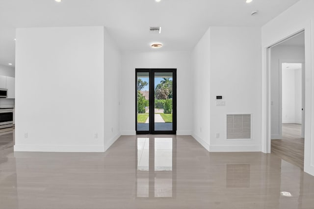 3920 Espan Ct, Palm Springs, FL 33461 - entryway with recessed lighting and light tile patterned flooring