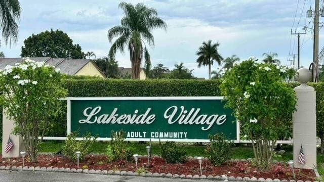 705 Lori Dr Unit 104, Palm Springs, FL 33461 - view of community sign