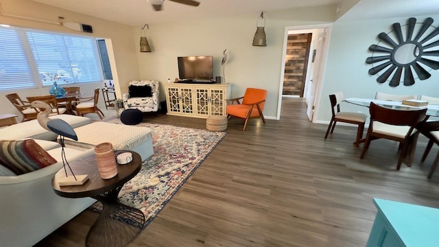 705 Lori Dr Unit 104, Palm Springs, FL 33461 - living room with wood finished floors, baseboards, and a ceiling fan