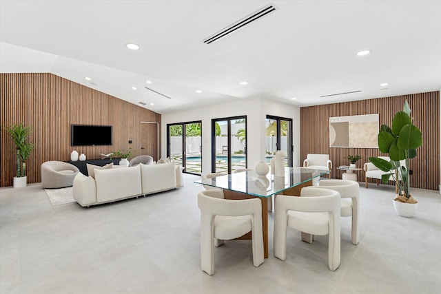 3701 NW 8th St, Delray Beach, FL 33445 - living area featuring wooden walls, lofted ceiling, an accent wall, and recessed lighting
