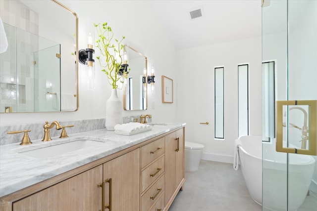 3701 NW 8th St, Delray Beach, FL 33445 - bathroom featuring double vanity, a freestanding bath, a shower stall, toilet, and vaulted ceiling