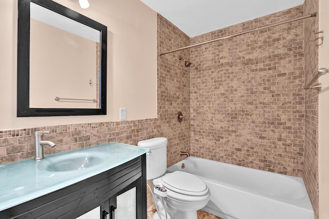 2765 Ashley Dr W Unit C, West Palm Beach, FL 33415 - bathroom featuring tile walls, vanity, and shower / bathtub combination