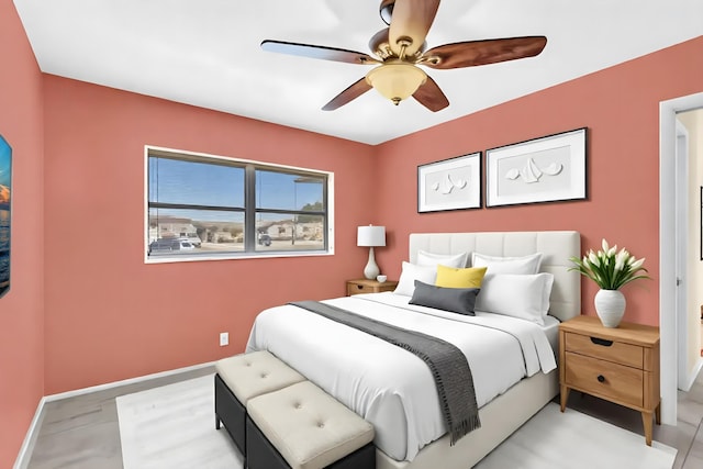 2765 Ashley Dr W Unit C, West Palm Beach, FL 33415 - bedroom with baseboards and ceiling fan