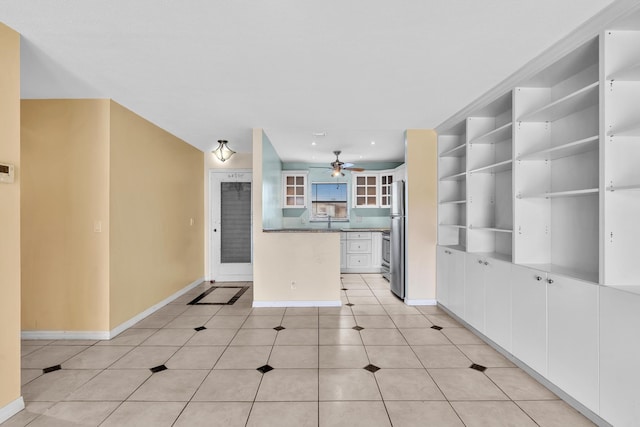 2765 Ashley Dr W Unit C, West Palm Beach, FL 33415 - kitchen featuring a ceiling fan, white cabinetry, glass insert cabinets, freestanding refrigerator, and recessed lighting
