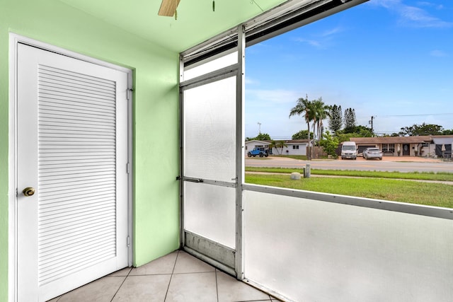 2765 Ashley Dr W Unit C, West Palm Beach, FL 33415 - unfurnished sunroom with ceiling fan