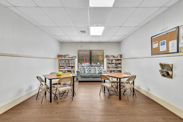 2765 Ashley Dr W Unit C, West Palm Beach, FL 33415 - dining room with wood finished floors and a paneled ceiling