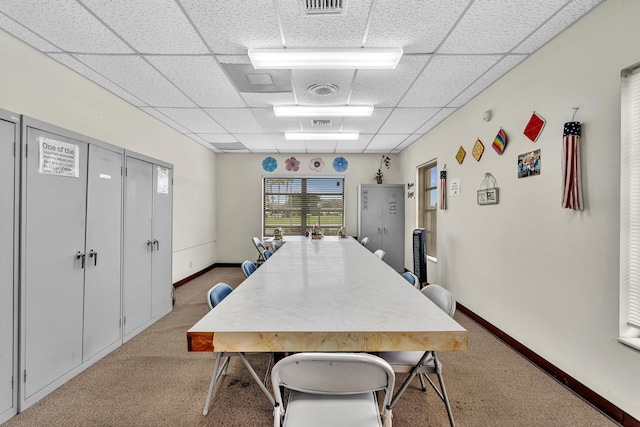 2765 Ashley Dr W Unit C, West Palm Beach, FL 33415 - carpeted dining room featuring a paneled ceiling and baseboards