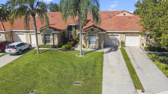 6392 Long Key Ln, Boynton Beach, FL 33472 - mediterranean / spanish-style house with driveway, stucco siding, a tiled roof, and a garage