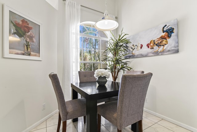 6392 Long Key Ln, Boynton Beach, FL 33472 - tiled dining room featuring baseboards