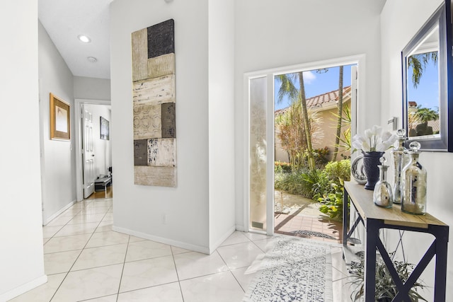 6392 Long Key Ln, Boynton Beach, FL 33472 - foyer with recessed lighting and light tile patterned flooring