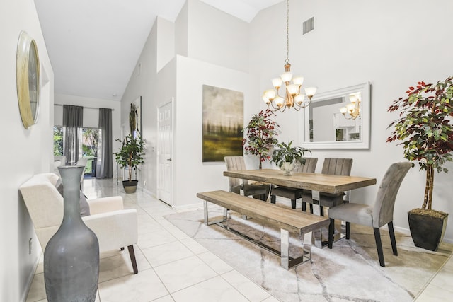 6392 Long Key Ln, Boynton Beach, FL 33472 - dining room with a chandelier, high vaulted ceiling, and light tile patterned floors