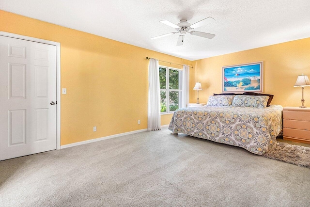 3995 Majestic Palm Way, Delray Beach, FL 33445 - bedroom featuring carpet floors, a textured ceiling, and a ceiling fan
