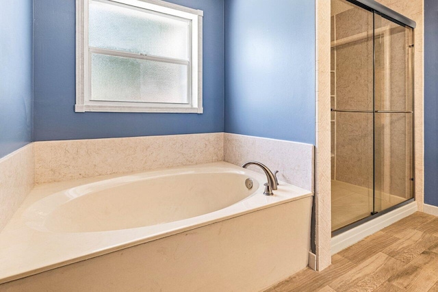 3995 Majestic Palm Way, Delray Beach, FL 33445 - full bathroom featuring a stall shower, a bath, and wood finished floors