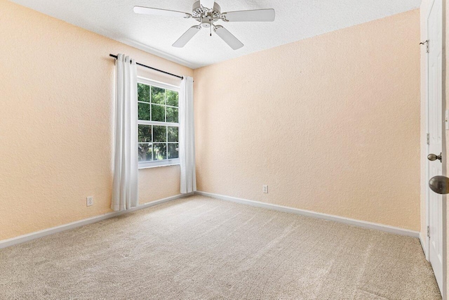 3995 Majestic Palm Way, Delray Beach, FL 33445 - carpeted spare room with a textured wall and a ceiling fan