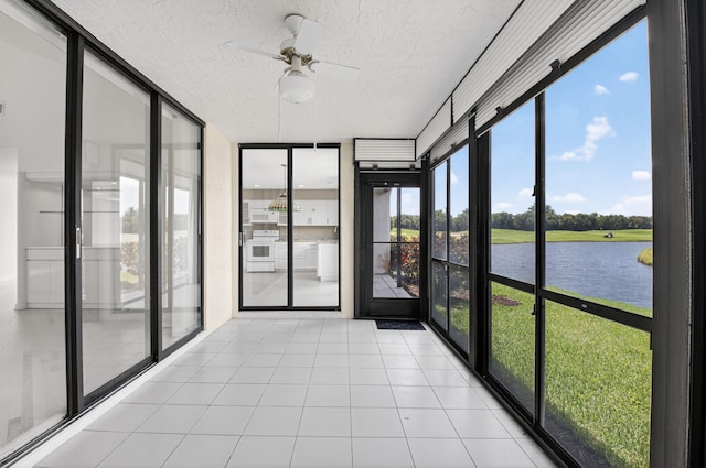 19630 Sawgrass Cir Unit 2901, Boca Raton, FL 33434 - unfurnished sunroom featuring a water view and a ceiling fan