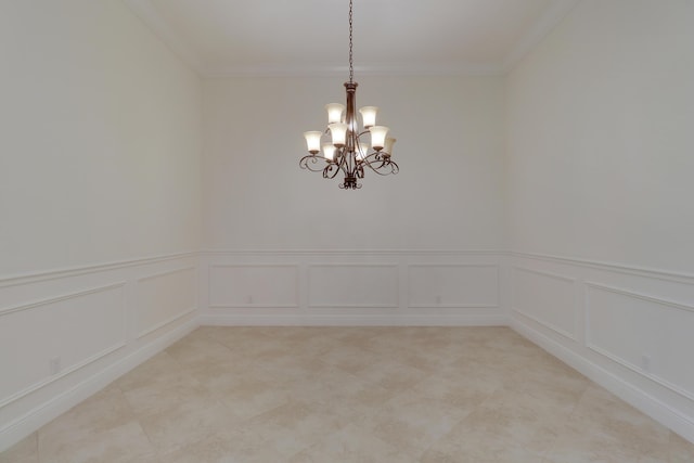 10479 SW Visconti Way, Port Saint Lucie, FL 34986 - unfurnished room featuring a decorative wall, crown molding, a chandelier, wainscoting, and light tile patterned floors