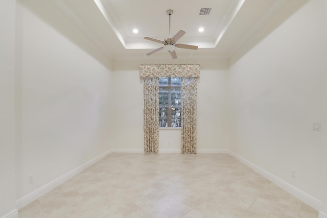 10479 SW Visconti Way, Port Saint Lucie, FL 34986 - unfurnished room featuring a tray ceiling, ornamental molding, a ceiling fan, and recessed lighting