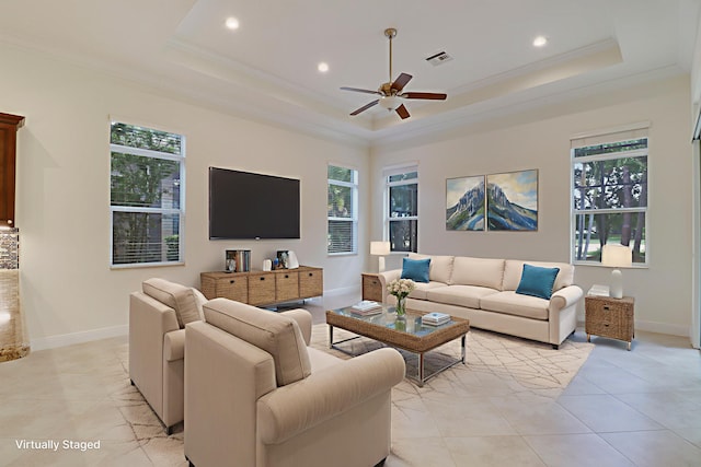 10479 SW Visconti Way, Port Saint Lucie, FL 34986 - living area featuring a raised ceiling, a ceiling fan, recessed lighting, light tile patterned floors, and ornamental molding