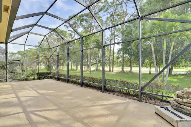 10479 SW Visconti Way, Port Saint Lucie, FL 34986 - view of patio / terrace with view of scattered trees and a lanai