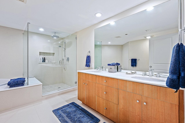 2100 S Ocean Blvd S Unit 206S, Palm Beach, FL 33480 - bathroom featuring a shower stall, double vanity, tile patterned floors, and recessed lighting