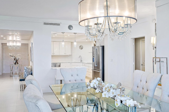 2100 S Ocean Blvd S Unit 206S, Palm Beach, FL 33480 - dining space with a chandelier and light tile patterned floors