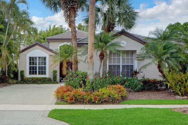 3346 NW 53rd Cir, Boca Raton, FL 33496 - mediterranean / spanish home featuring stucco siding and a tile roof