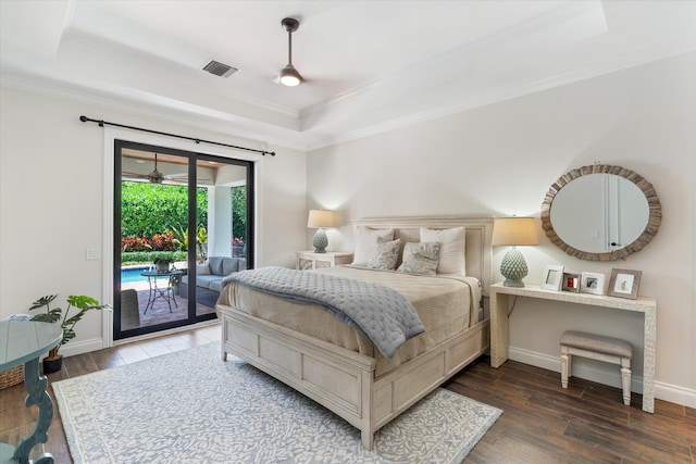 425 NW 12th St, Delray Beach, FL 33444 - bedroom featuring a tray ceiling, crown molding, access to exterior, and wood finished floors