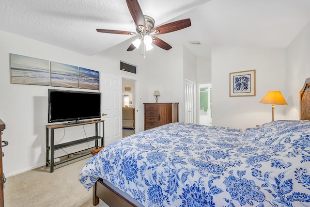 4386 SE Scotland Cay Way, Stuart, FL 34997 - bedroom with vaulted ceiling, carpet, ceiling fan, baseboards, and a closet