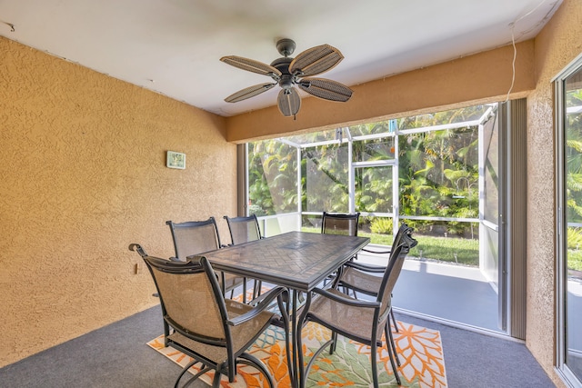 4386 SE Scotland Cay Way, Stuart, FL 34997 - sunroom with healthy amount of natural light, a ceiling fan, and outdoor dining space
