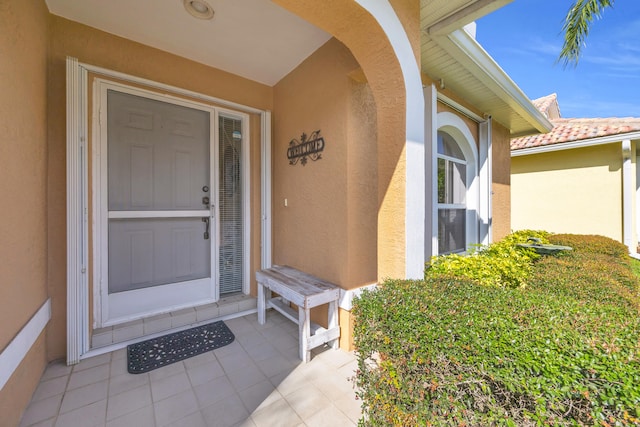 4386 SE Scotland Cay Way, Stuart, FL 34997 - property entrance with stucco siding