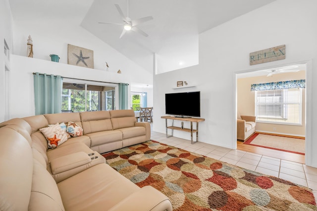 4386 SE Scotland Cay Way, Stuart, FL 34997 - tiled living area featuring high vaulted ceiling, a ceiling fan, and baseboards