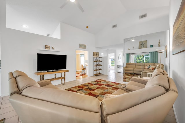 4386 SE Scotland Cay Way, Stuart, FL 34997 - living room with a ceiling fan, light tile patterned floors, and high vaulted ceiling