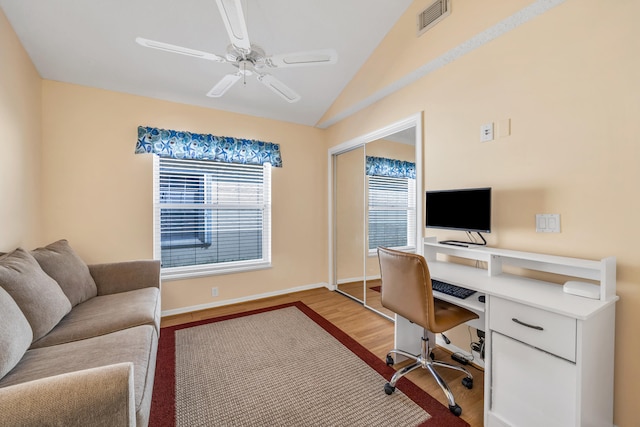 4386 SE Scotland Cay Way, Stuart, FL 34997 - office space featuring a ceiling fan, vaulted ceiling, light wood-type flooring, and baseboards