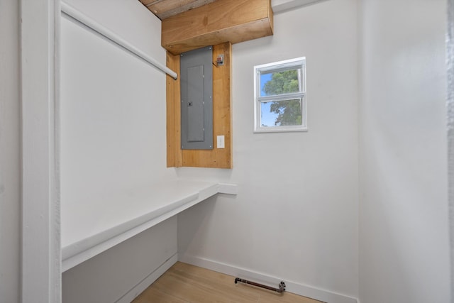 1567 NE Sottong Ave, Jensen Beach, FL 34957 - walk in closet with electric panel and light wood finished floors