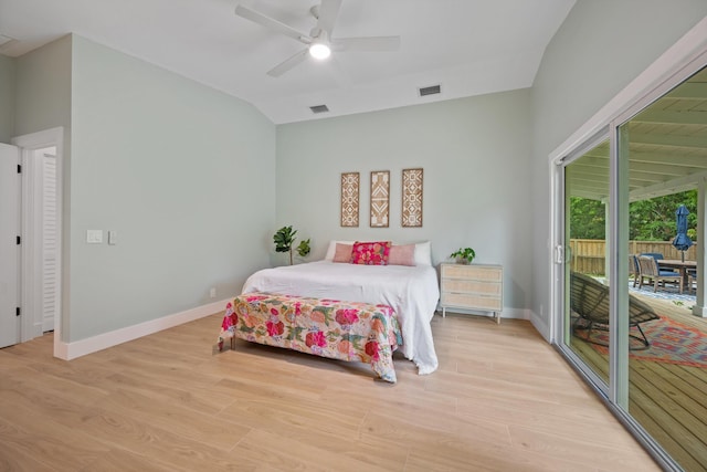 1567 NE Sottong Ave, Jensen Beach, FL 34957 - bedroom featuring vaulted ceiling, access to outside, light wood-style floors, baseboards, and ceiling fan