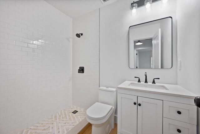 1567 NE Sottong Ave, Jensen Beach, FL 34957 - full bath featuring vanity, tiled shower, and toilet
