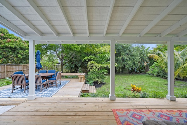 1567 NE Sottong Ave, Jensen Beach, FL 34957 - wooden deck with outdoor dining space